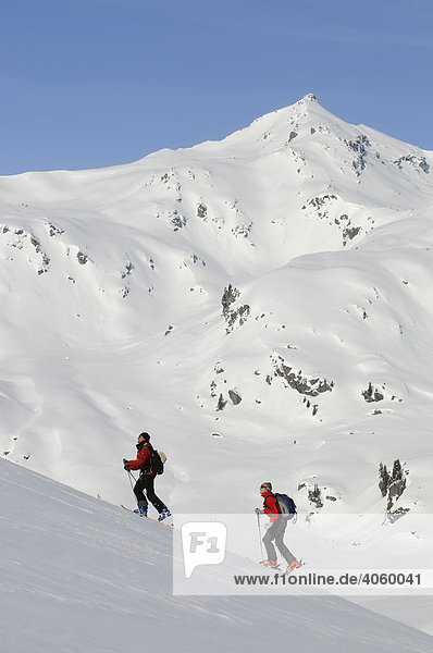 Ski wanderers on ski tour at Tristkopf  Kelchsau  Tyrol  Austria  Europe