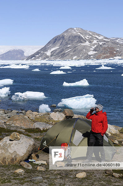 Trekker  tent  camping in the Johan-Petersen-Fjord  East-Greenland  Greenland