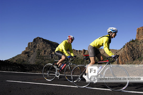 Racing cyclists in the Teide National Park  Tenerife  Canary Islands  Spain  Europe
