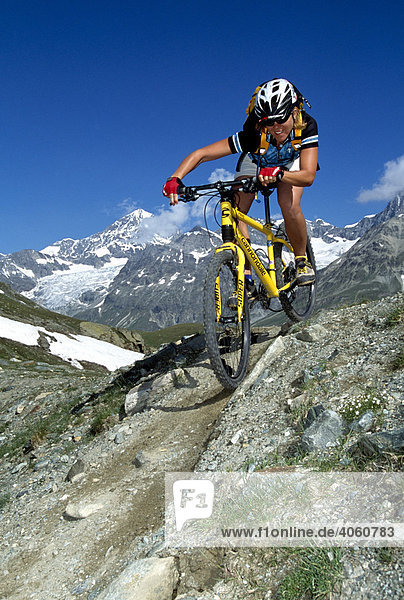 Mountainbiker in front of Mt. Rothorn  Zermatt  Wallis  Switzerland  Europe