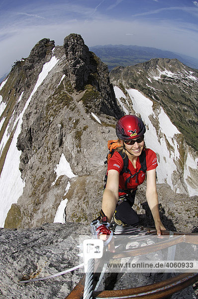 Rock climber on Hindelanger climbing route  Oberstdorf  Allgaeu  Bavaria  Germany  Europe