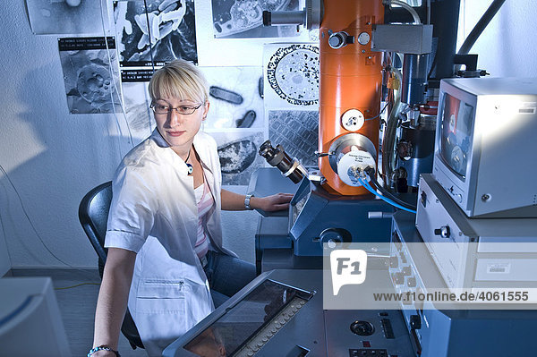 Laboratory technician working on an electron microscope  Max-Planck research Fermentation protein folding  Halle  Germany  Europe