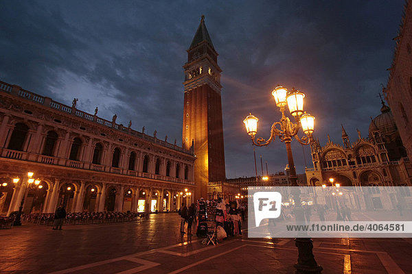 Illuminated St. Mark's Basilica and Campanile  bell tower  in Venice  Italy  Europe