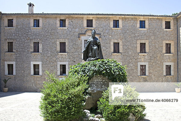Memorial to the bishop Pere-Joan Campins in the cloistered courtyard of the Santuario de lluc Monastery  county of Escorca in the basin of the Serra Tramuntana Mountains on Mallorca  Balearic Islands  Spain  Europe