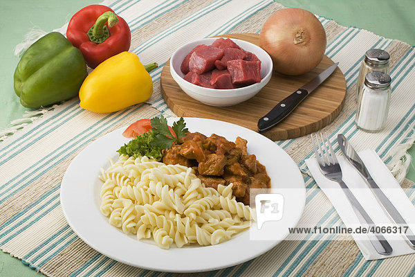 Bell pepper goulash with noodles  onion  bell pepper and beef cubes