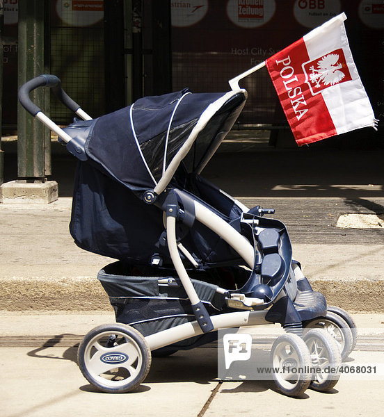 Polish flag attached to a baby carriage