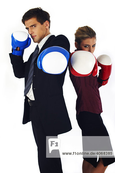 Man and woman wearing boxing gloves
