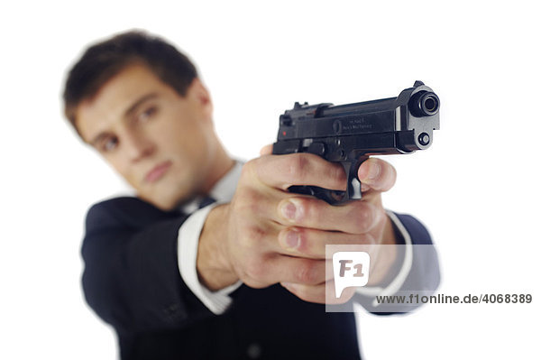 Businessman targeting his gun