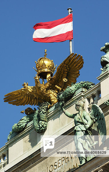 Imperial double-headed eagle and the Austrian flag on the roof of the national library  Hofburg Imperial Palace  Vienna  Austria  Europe