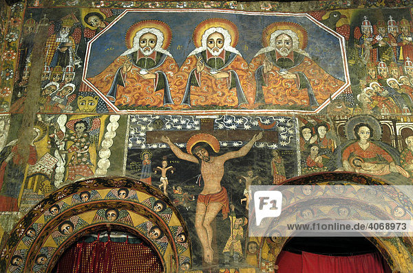 Ethiopian Orthodox Christianity  wall painted with the Holy Trinity over an image of Christ on the cross  in the Church of the Holy Trinity Debre Berhan Selassie in Gondar  Ethiopia  Africa