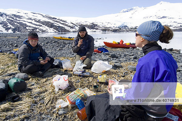 Sea kayak  resting  picnic  Blackstone Bay  Pacific Coast  Prince William Sound  Alaska  USA