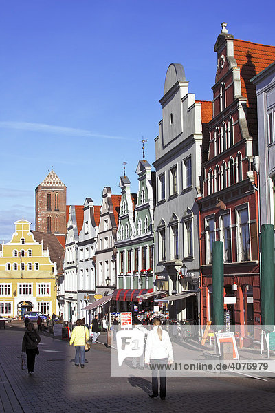 Historic town houses  Kraemerstrasse  at back St. Nikolai Church in the Old Town of Wismar  UNESCO World Heritage Site  Mecklenburg-Western Pomerania  Germany  Europe