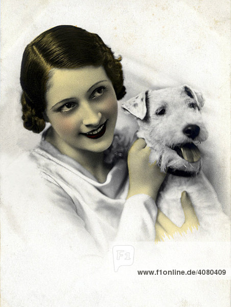 Historic photograph  woman with a Foxterrier  around 1922
