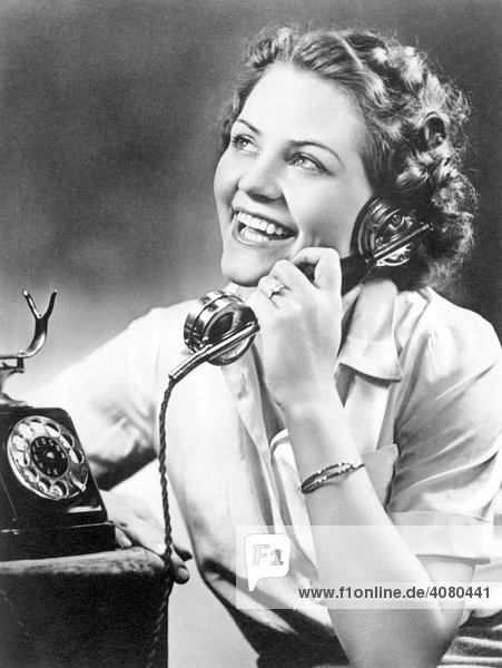 Historic photograph  woman on the phone  around 1940