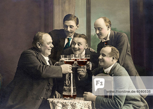 Men drinking beer or red wine  historic photograph  around 1913