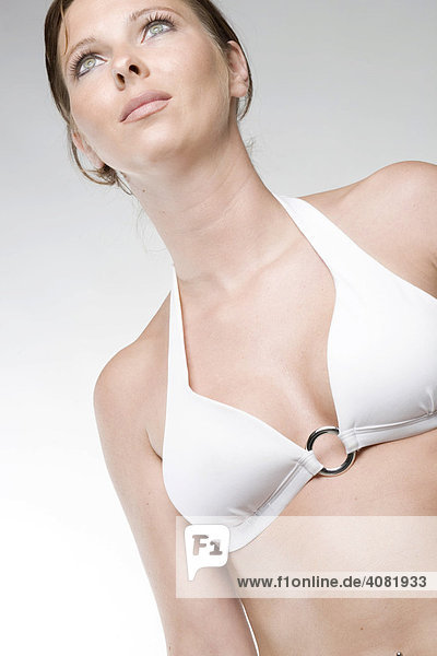 Woman with white bikini top