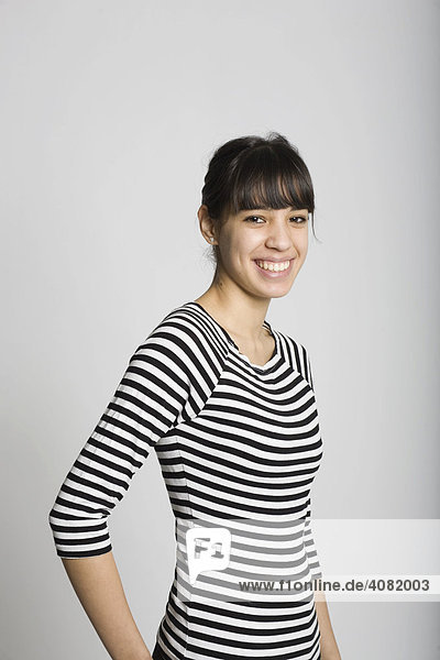 Young woman wearing a black-and-white striped top