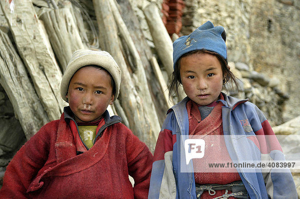 Two Tibetan boys Phu Nar-Phu Annapurna Region Nepal