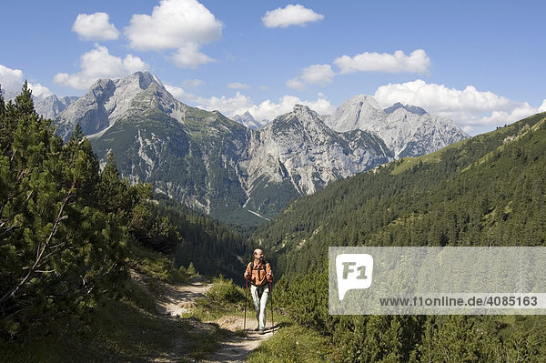 In the Rissbachtal Rissbach valley in the Karwendel mountains Tyrol austria mountain hiker on the way to the Plumsjoch above the Eng