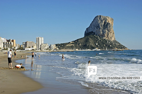 Tourist and playing children at the beach of Calpe  Penon de Ifach  Costa Blanca  Spain