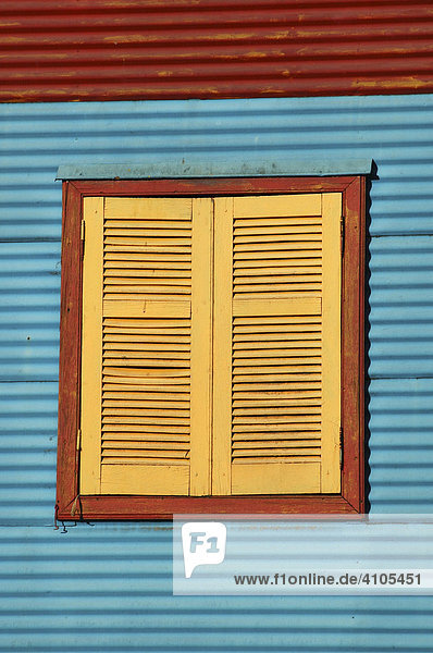 Colourful wall and window shutter in Caminito  La Boca  Buenos Aires  Argentina.