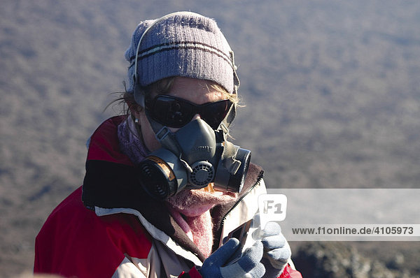 Gas mask against volocano fumes  Volcano Villarrica  Pucon  Patagonia  Chile