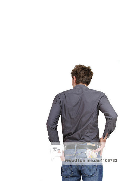Junger  erwachsener Mann  Euro-Scheine lugen aus der Gesäßtasche seiner Jeans hervor