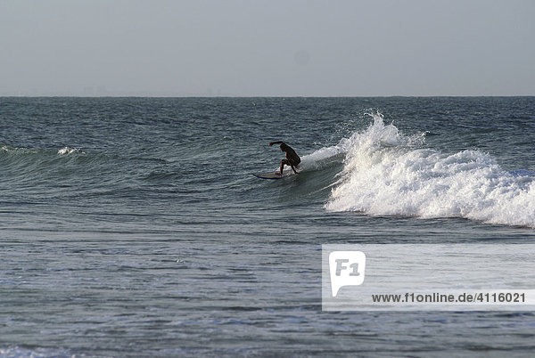 Surfer in Iguape near Fortaleza  Ceara  Brazil