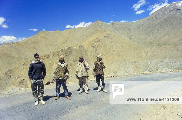 Road workers on the main highway between Kashmir and Ladakh  India
