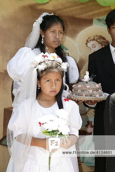 Bride with wedding cake and flower girl  Indian wedding  Loma Plata  Chaco  Paraguay  South America