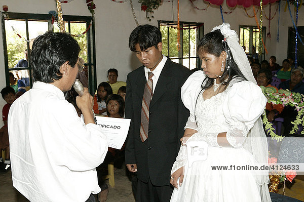 Bridal couple getting the marriage document  Indian wedding  Loma Plata  Chaco  Paraguay  South America