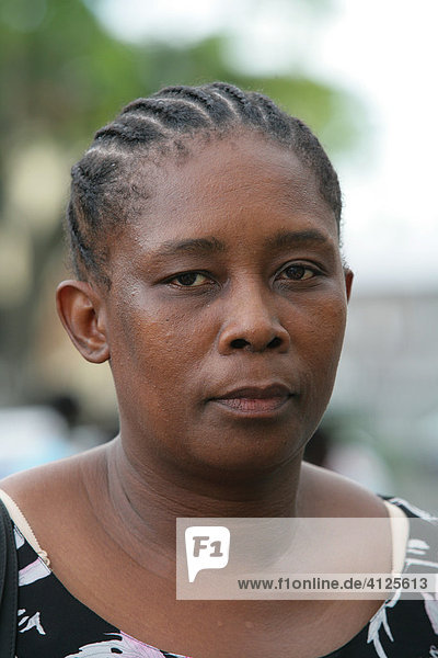 Portrait of woman of African ethnicity at a protest against violence against women  Georgetown  Guyana  South America