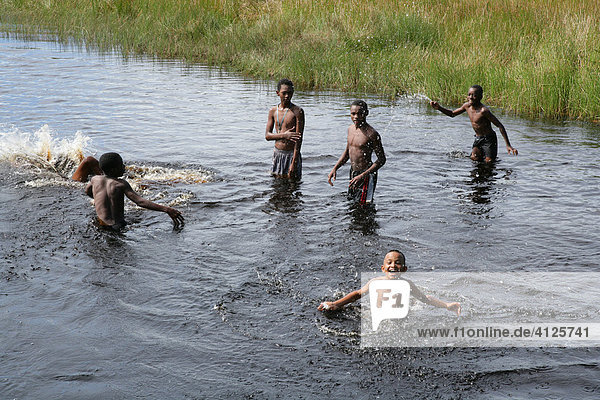 Children swimming in Lake Capoey  Guyana  South America