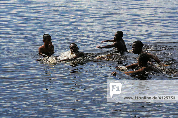 Children swimming in Lake Capoey  Guyana  South America