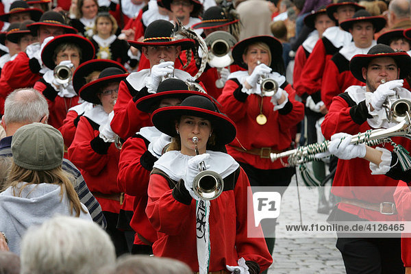 Brass band dressed in traditional garb at an international festival for traditional costume in Muehldorf am Inn  Upper Bavaria  Bavaria  Germany  Europe