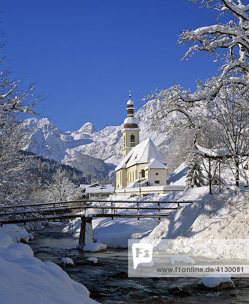 St. Sebastian's Church and Ramsauer Ache River in winter  Ramsau  Berchtesgadener Land region  Upper Bavaria  Bavaria  Germany  Europe