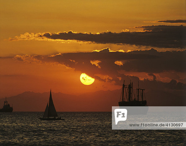Ships in the sunset  Manila Bay  Luzon  Philippines