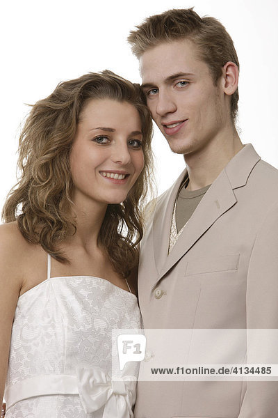 Young  dressed up couple smiling