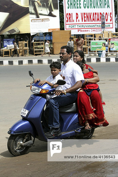 IND  India  Kerala  Trivandrum : Motorbike with passengers  city center. |