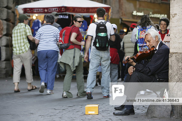 ITA  Italy  Rome : Street musician at Via della Cuccagna near Piazza Navona. |