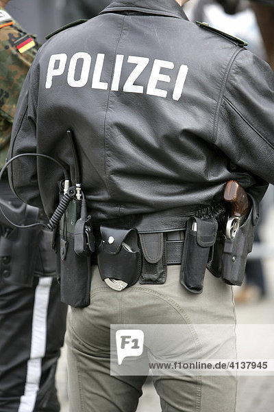 DEU  Germany : Police office with equipment belt. |