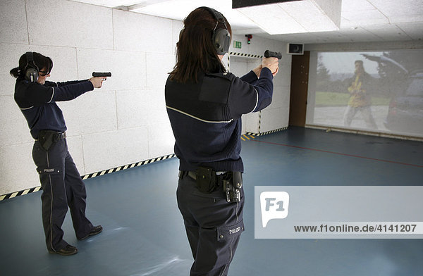 Video projection shooting range used for routine weapons training at the Police HQ or headquarters in Mettmann  North Rhine-Westphalia  Germany  Europe