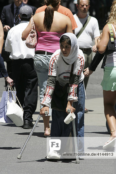 USA United States of America New York City: Midtown Manhattan 5th Avenue. Beggar.