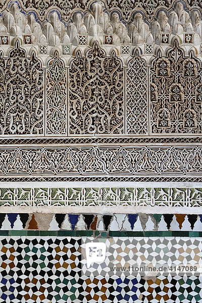 Wall decorated with stucco work and mosaic tiles  Palais de la Bahia  historic Medina quarter  Marrakesh  Morocco  Africa