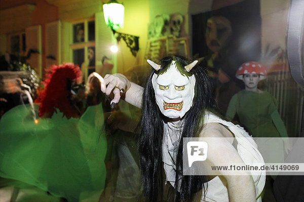 Young girl frightening spectators Halloween event for children theatre museum Duesseldorf NRW Germany