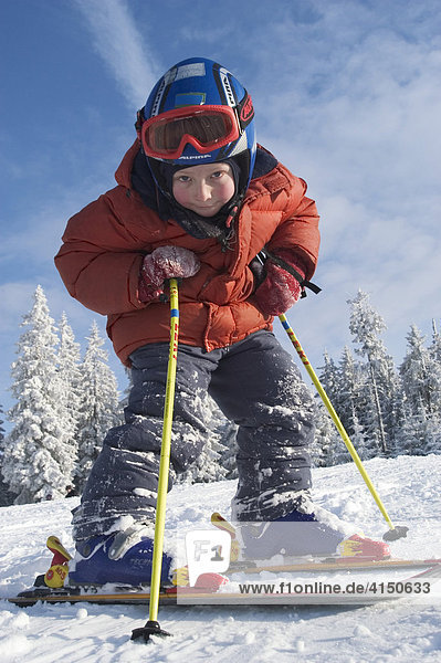Six year old boy on skis Winkelmoosalm Upper Bavaria Germany Salzburger Land Austria