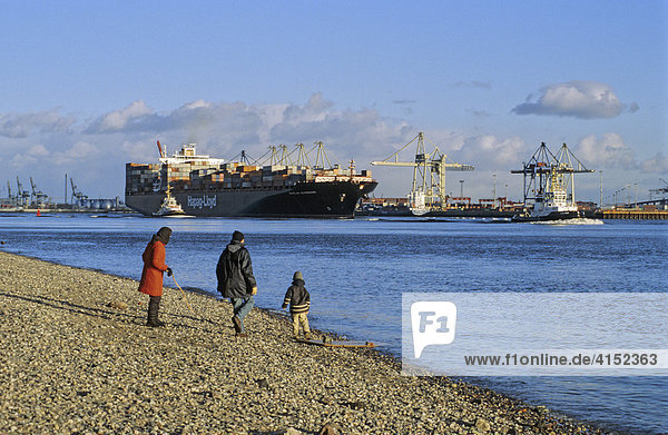 Huge container ship on river Elbe at Hamburg Germany