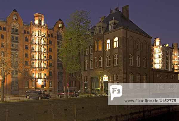 Wasserschloss  Water Castle in the old warehouse district Speicherstadt in Hamburg at night  Germany