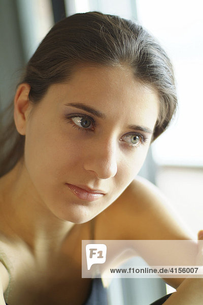 Portrait of a young woman in sports clothes
