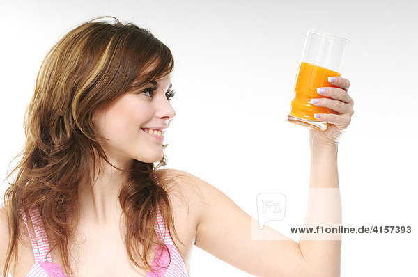 Young woman drinking juice